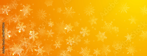 Christmas background of beautiful complex big and small snowflakes in yellow colors. Winter illustration with falling snow