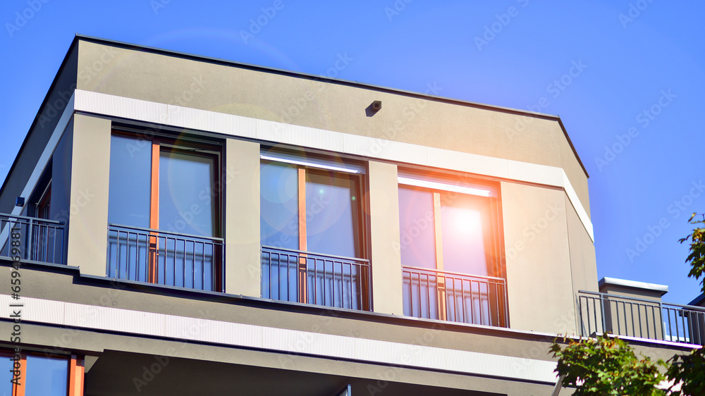 Brand new apartment building on sunny day. Modern residential architecture. Modern multi-family apartment house. Brand new apartment building on sunny day. Modern residential architecture. Modern multi-family apartment house.