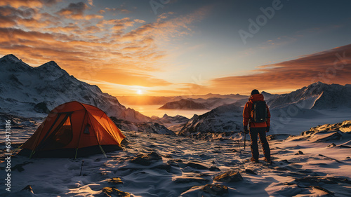 Sunset Camping in the Mountains, Traveler On Rock Top with Tent. Climbers, Hiking Fitness And Adventure, Standing on a Mountain with Large Backpacks, Mountaineer alpinist men, Extreme Sports