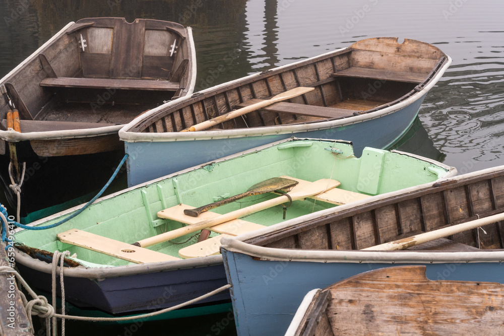 Dinghies tied up to the dock at Center Harbor, Brooklin, Maine. 