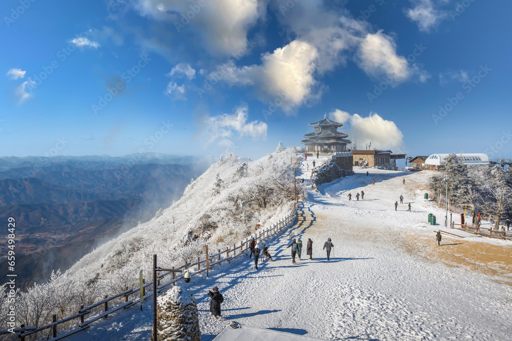 Korea Winter and Tourists atop Deogyusan Mountain at Deogyusan National Park near Muju, South Korea.