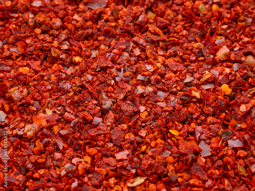 Crushed red pepper heap texture background Crushed red pepper heap texture background
