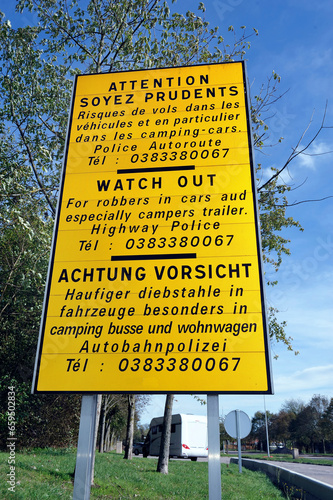 Sign alongside a parking lot at the hiighway in France. photo
