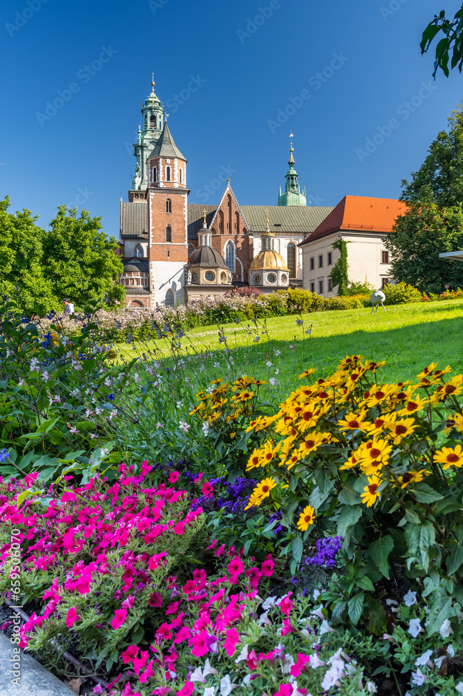 Summer view of Wawel cathedral and Wawel castle with blooming flower on the Wawel Hill, Krakow, Poland