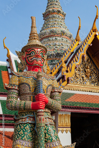 A close up view of a demon guard statue at the Grand Palace in Bangkok, Thailand.