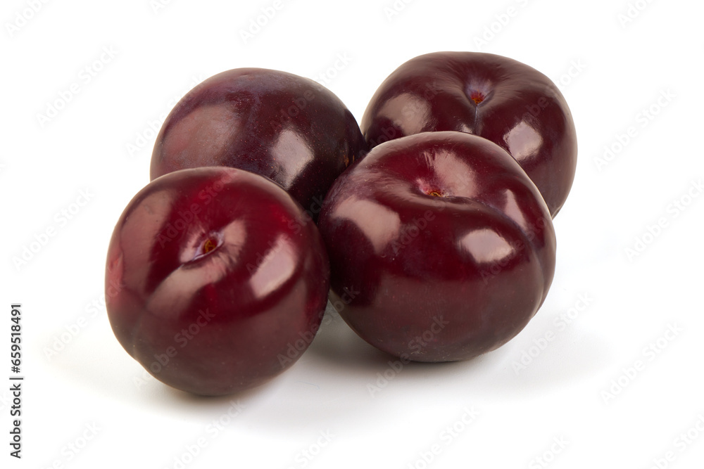 Isolated plums. One and a half of red plum fruit, isolated on white background.