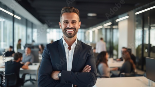 Portrait of handsome young businessman in office