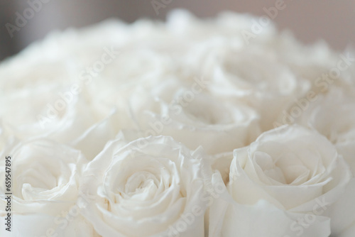 White roses Flower Arrangement in a glass vase