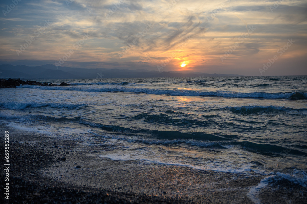 shore of the Mediterranean sea autumn 2023 in the setting sun 2