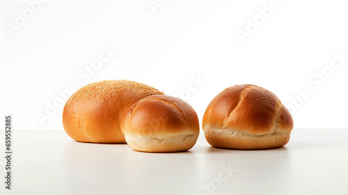 Bread and two buns on a white background. Hole meal breads rolls isolated on white background. Bread on white background.