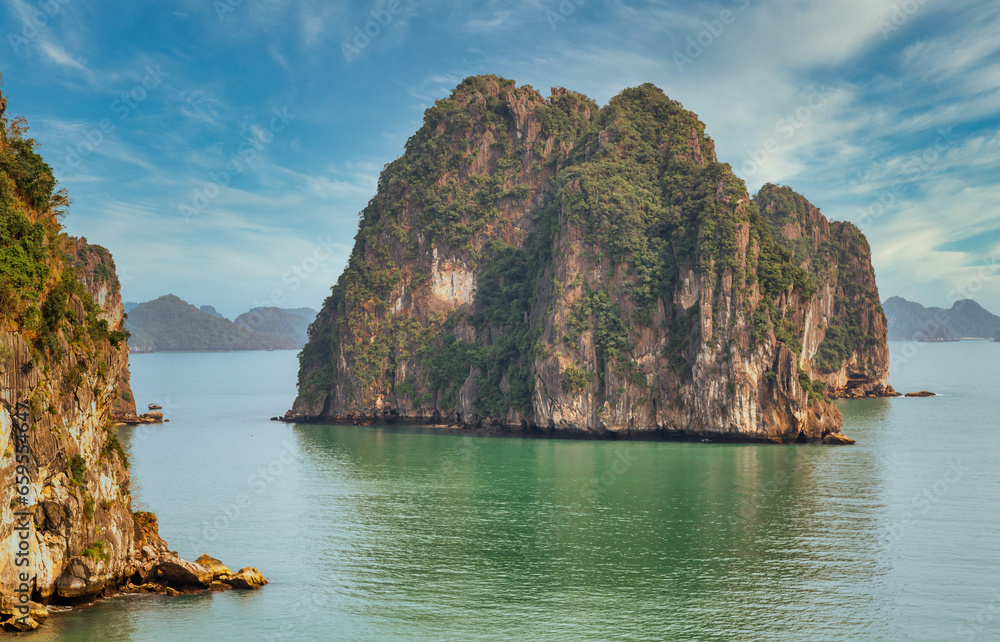View of some of the 1,600 limestone island, that looks like something right out of a movie. UNESCO World Heritage Site since 1994 features a wide range of biodiversity. View of some of the 1,600 limestone island, that looks like something right out of a movie. UNESCO World Heritage Site since 1994 features a wide range of biodiversity.