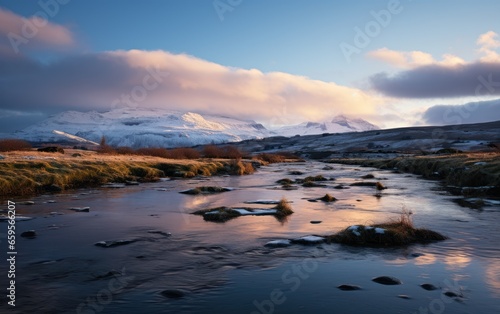 Water near high stone hills in snow © Tisha