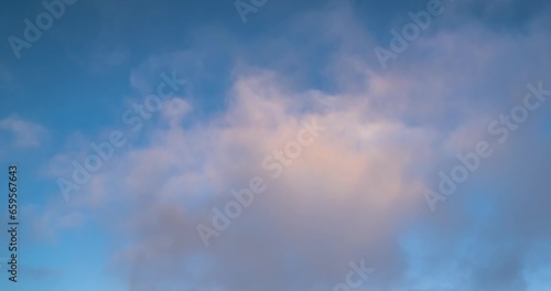 Blue sky white clouds. Puffy fluffy white clouds. Cumulus cloud cloudscape timelapse. Summer blue sky time lapse. Nature weather blue sky. White clouds background. Cloud time lapse , video loop photo