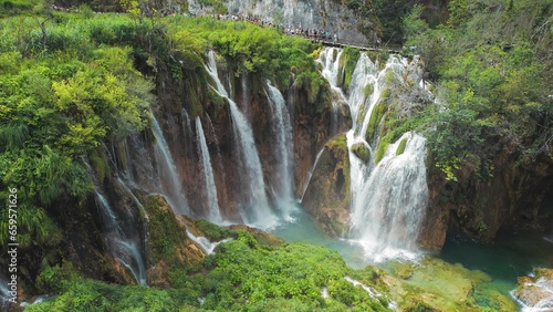 Plitvice Lakes National Park with many waterfalls. Clean water flows from cliffs in cascades. Nature in Croatia.