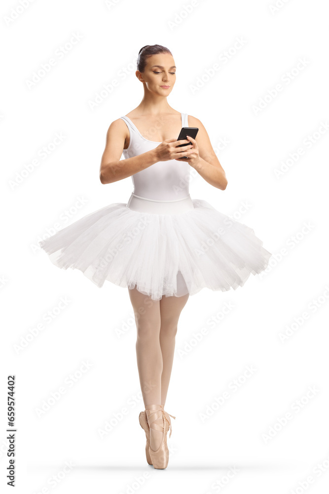 Naklejka premium Full length shot of a ballerina using a smartphone
