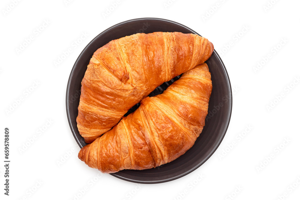 Plate with croissants on a white background. View from above. French pastries Plate with croissants on a white background. View from above. French pastries