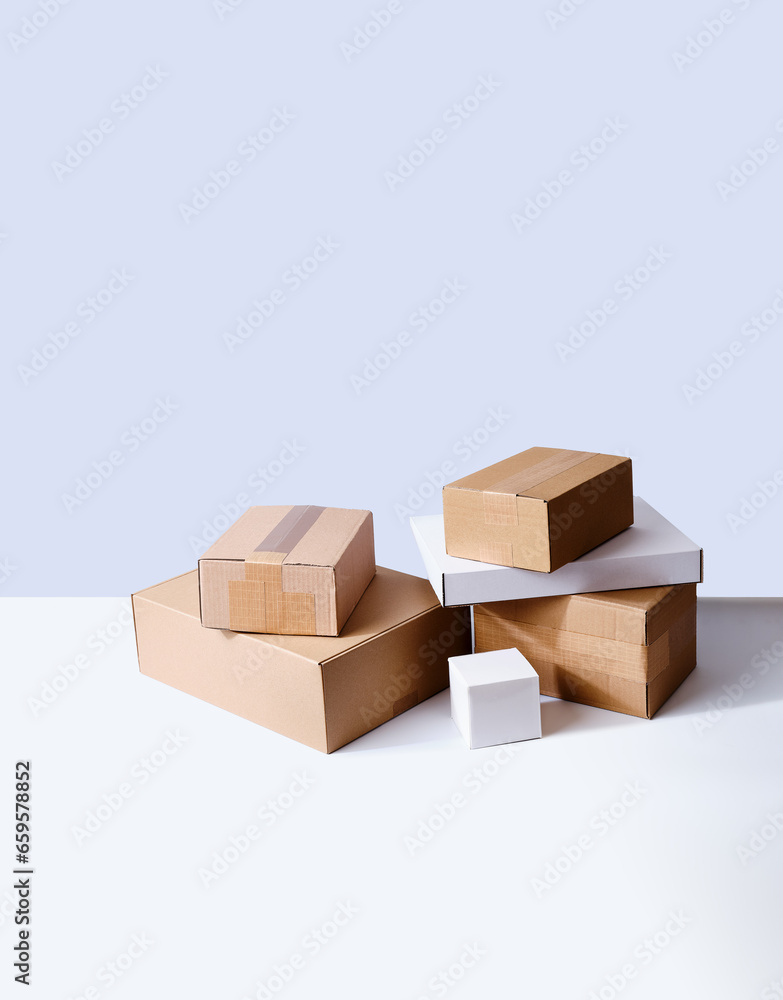 Fototapeta premium Stack of cardboard packages and delivery boxes