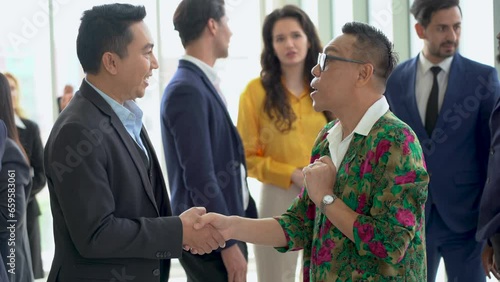 group of diversity business people shaking hands and greeting each other Exchanging Business Cards after a meeting conference or seminar. Communication in Corporate at office. connecting people. asian