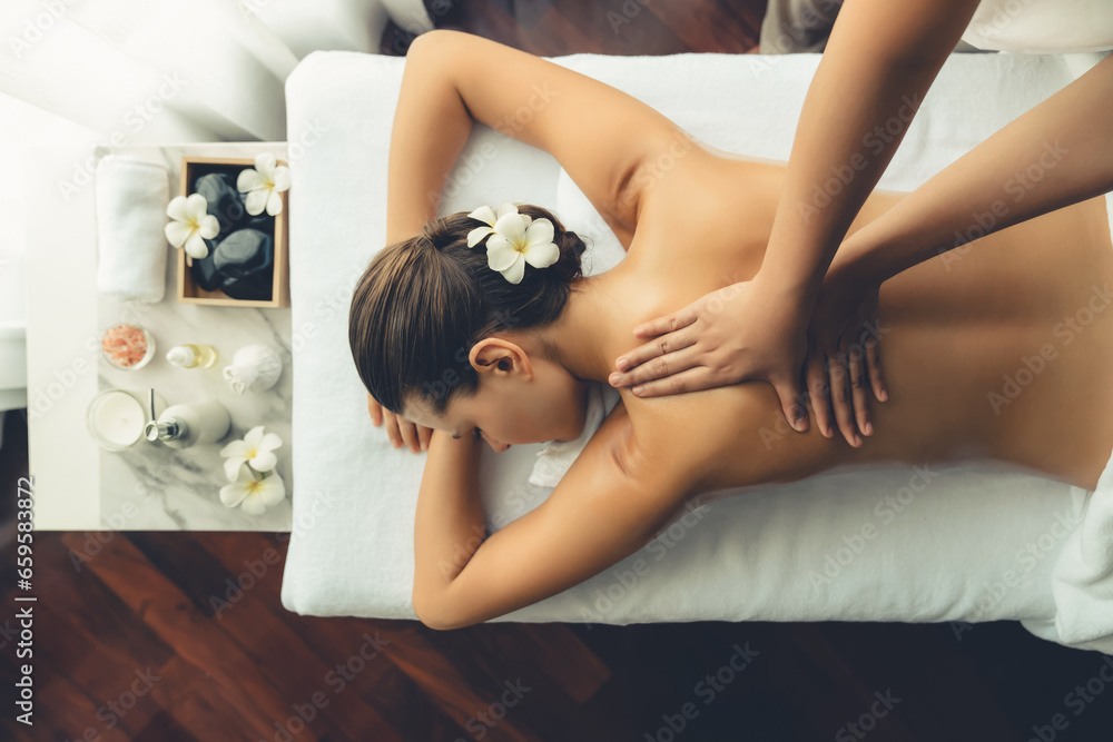 Panorama top view woman customer enjoying relaxing anti-stress spa massage and pampering with beauty skin recreation leisure in day light ambient salon spa at luxury resort or hotel. Quiescent - obrazy, fototapety, plakaty 