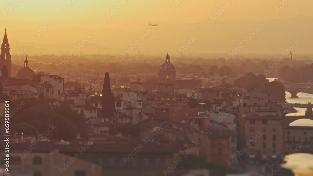 Cathedral of Saint Mary of the Flower at sunrise or sunset, Italy, Florence. Plane flying over picturesque golden sunset city landscape. Tourism, holidays, weekend, vacation concept. Famous attraction Cathedral of Saint Mary of the Flower at sunrise or sunset, Italy, Florence. Plane flying over picturesque golden sunset city landscape. Tourism, holidays, weekend, vacation concept. Famous attraction