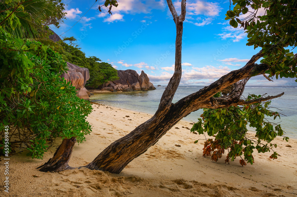 Anse Source D'argent beach at the La Digue Island, Seychelles, with Indian Ocean and amazing granite rock formations. Anse Source D'argent beach at the La Digue Island, Seychelles, with Indian Ocean and amazing granite rock formations.