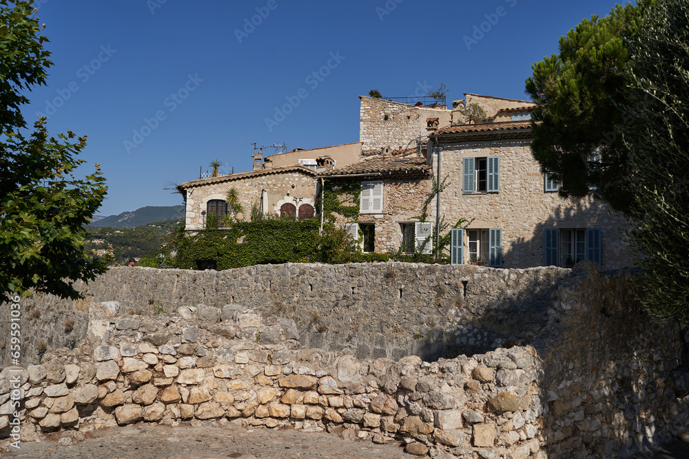 Saint-Paul de Vence, France – August 11, 2023 - traditional old stone houses on a street in the medieval town of Saint Paul de Vence