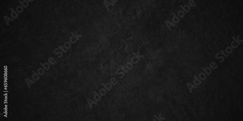 Black stone wall texture grunge rock surface. dark gray concrete background backdrop. wide panoramic banner. old wall stone for dark black distressed grunge background wallpaper rough concrete wall.