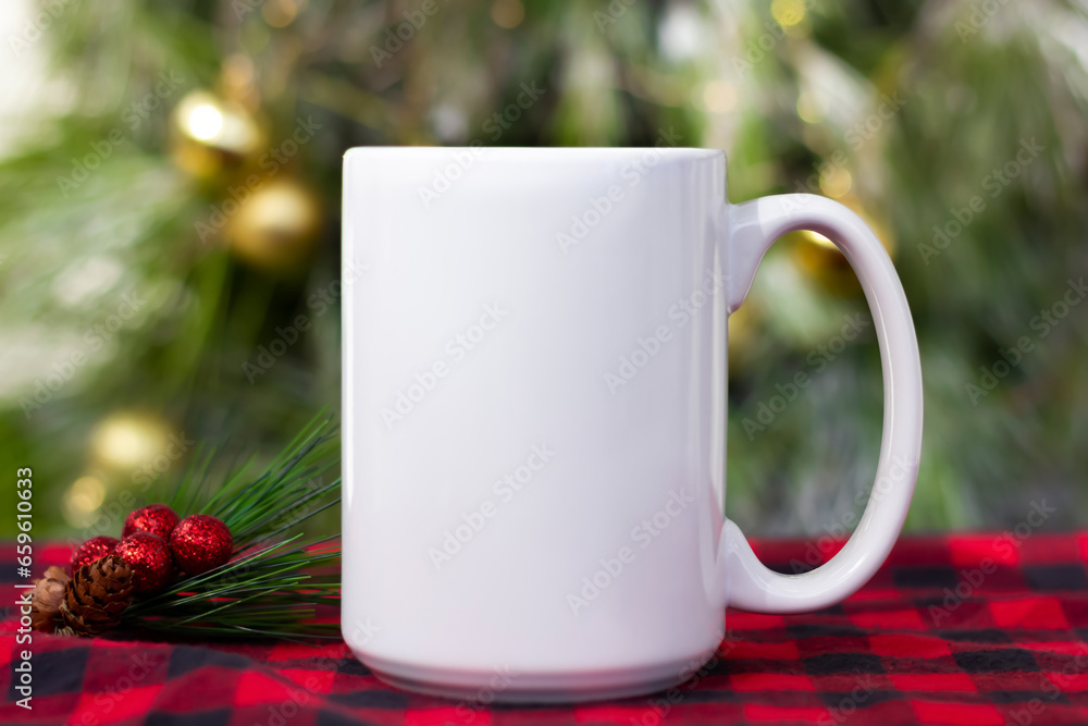 White 15 oz white mug on a red green christmas background . 15 oz , big, large cup mock up for your cup design