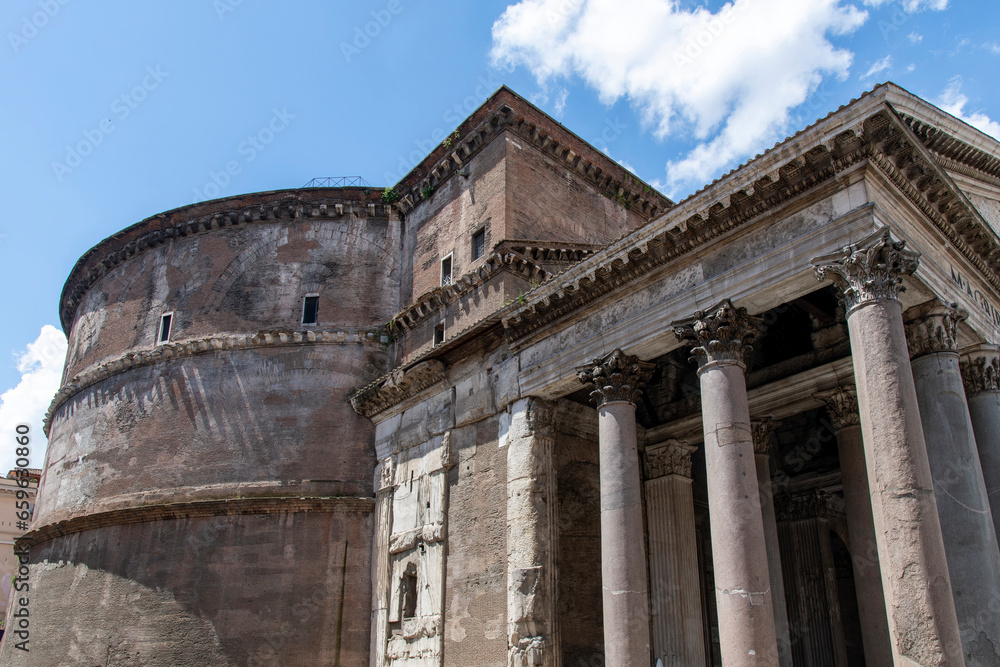 Low angle view of the former Roman temple Pantheon (temple of all the gods) and since 609 AD a Catholic church (Basilica of St. Mary and the Martyrs) in Rome, Italy