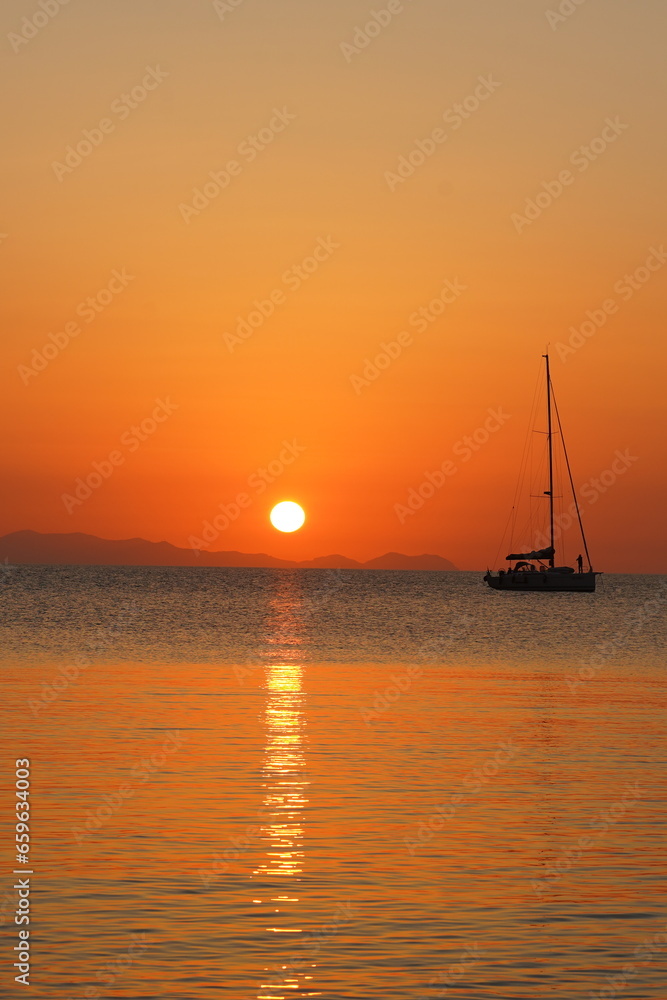 Boat at Sunset on the Sea