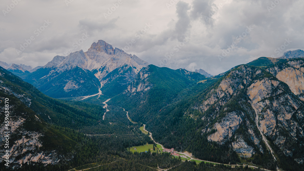 The Dolomites, located in northern Italy, are a stunning mountain range renowned for their dramatic and jagged peaks, lush alpine meadows, and breathtaking natural beauty. 