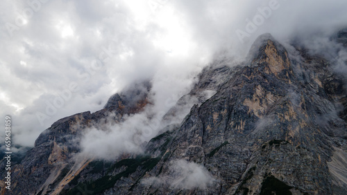 The Dolomites, located in northern Italy, are a stunning mountain range renowned for their dramatic and jagged peaks, lush alpine meadows, and breathtaking natural beauty. 