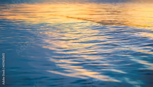 Dream majestic sea ocean water surface. Fantasy seascape closeup ripples waves soft golden blue colors panoramic background. Abstract nature sunset nature. Sunlight calm peaceful World Environment day