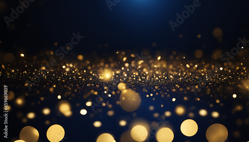 Abstract dark blue and gold particle background. Christmas golden light shine bokeh particles on a background of navy blue. Gold foil appearance. holiday idea