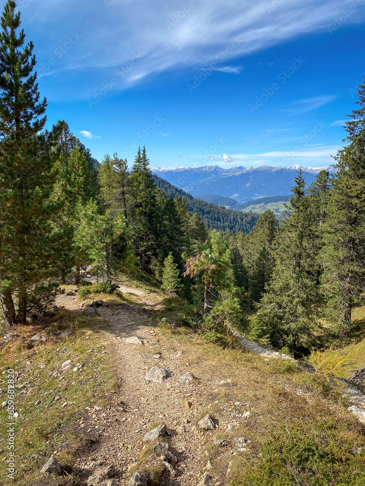 Scenic view of Val di Funes Villnoessertal seen from Adolf-Munkel-Weg hiking trail in South Tyrol, Italy. Scenic view of Val di Funes Villnoessertal seen from Adolf-Munkel-Weg hiking trail in South Tyrol, Italy.