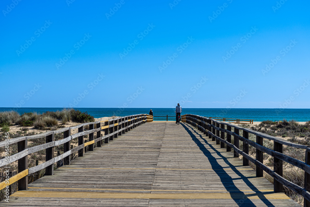 Wooden path to Manta Rota beach.  West Atlantic coast of Algarve region, south of Portugal.