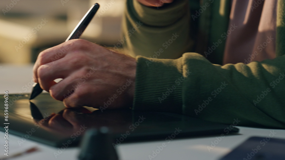 Designer hand creating tablet at sunny workplace close up. Man answering call