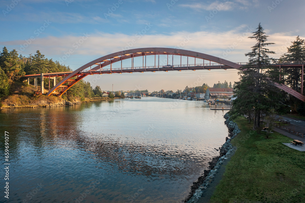 La Conner is a popular tourist town in the heart of the Skagit Valley, Washington. Rainbow Bridge connects Fidalgo Island and La Conner, crossing Swinomish Channel in Skagit County, Washington. 