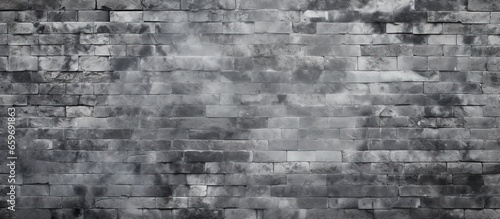 Texture of a wall made of grey bricks