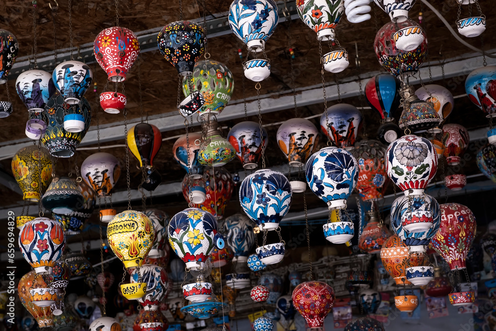 ceramic hot air balloons displayed in a souvenir store in cappadocia turkey, selective focus, horizontal