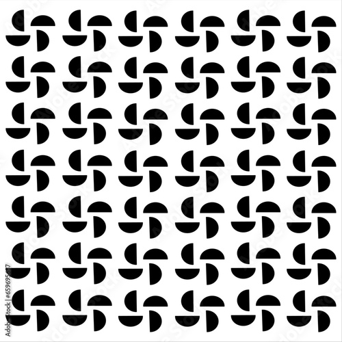a black semi-circle image that is spun into a flower