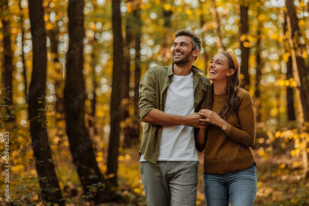 Portrait of happy couple hugging in the forest Portrait of happy couple hugging in the forest