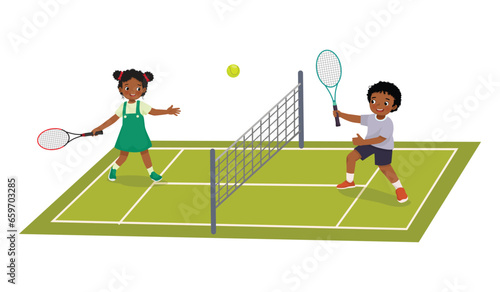 Happy little African kids playing tennis