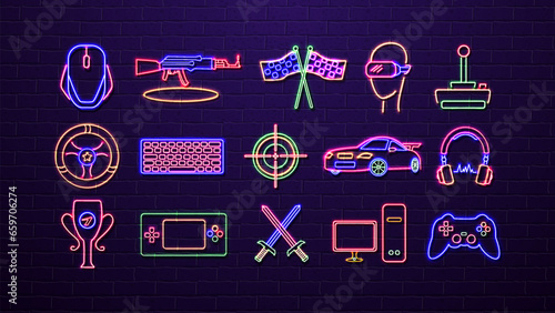 A set of neon icons for cyber sports, virtual reality, computer and console games on a brick wall background.