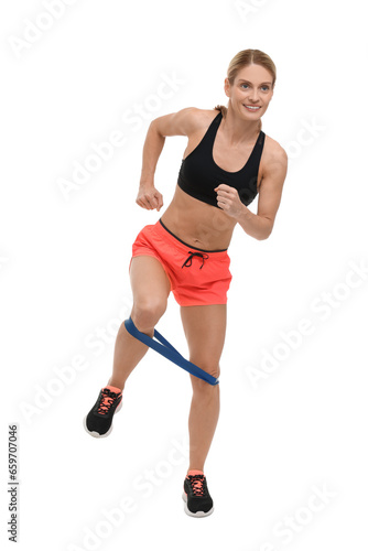Woman exercising with elastic resistance band on white background © New Africa