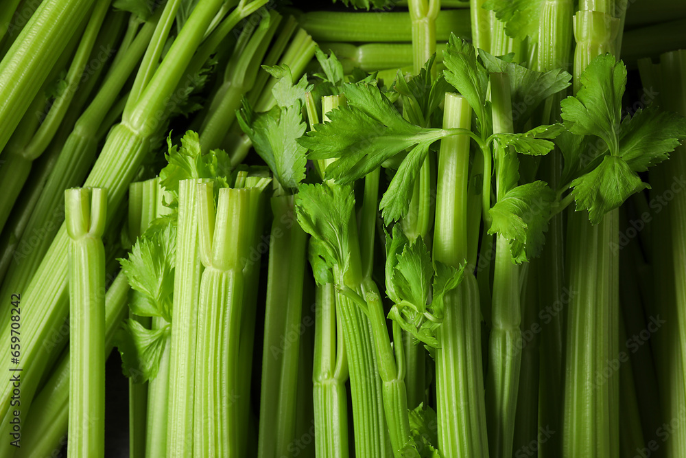 Fototapeta premium Many fresh green celery bunches as background, top view