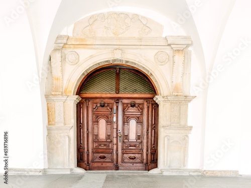 Beautiful old door in a stone house in the old town of Krosno, Poland. photo