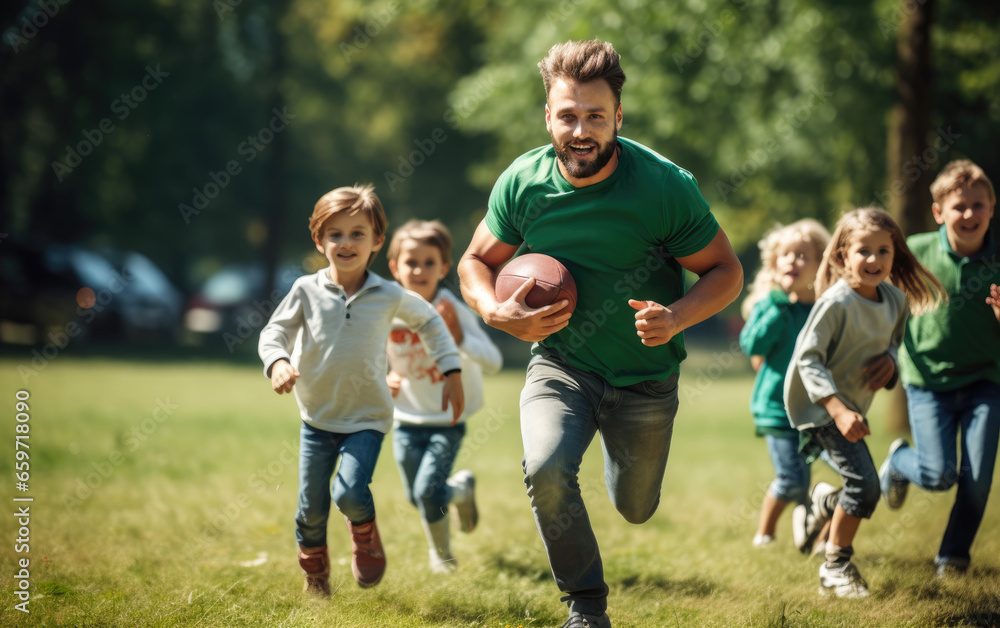 Elementary school coach playing American football with his students