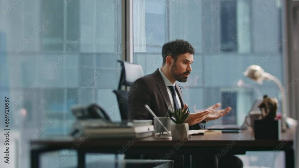 Nervous ceo complaining video calling at workplace. Manager quarrelling online Nervous ceo complaining video calling at workplace. Manager quarrelling online