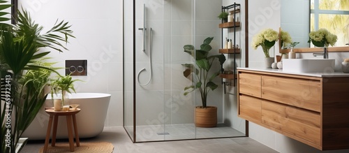 New minimal bathroom interior with glass shower vanity cabinet and bright design